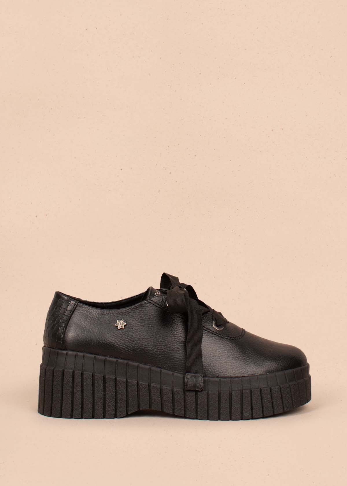 Ataduras en cuero color negro con textura tipo croco 104476