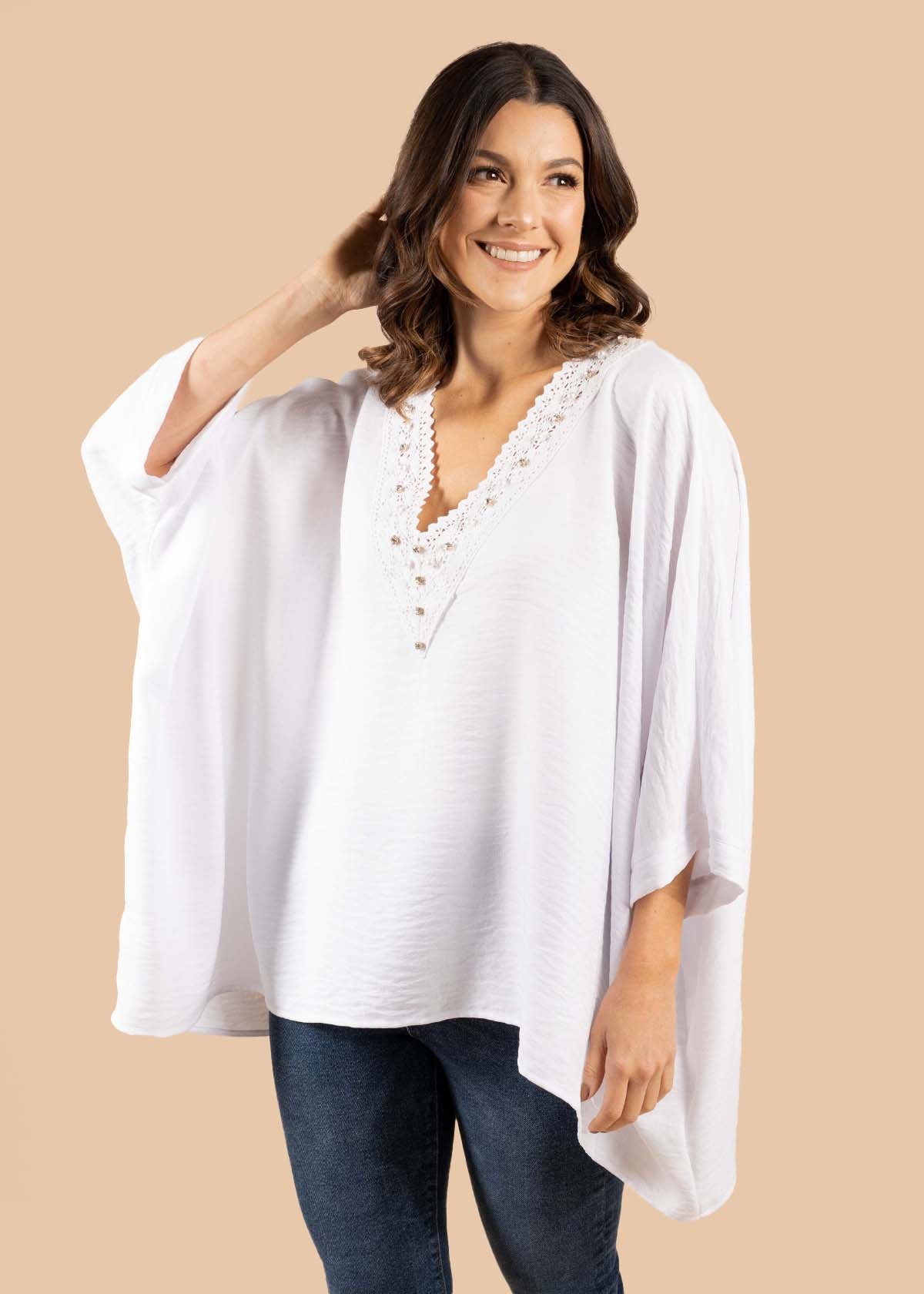 Blusa color blanco con perlas 105198
