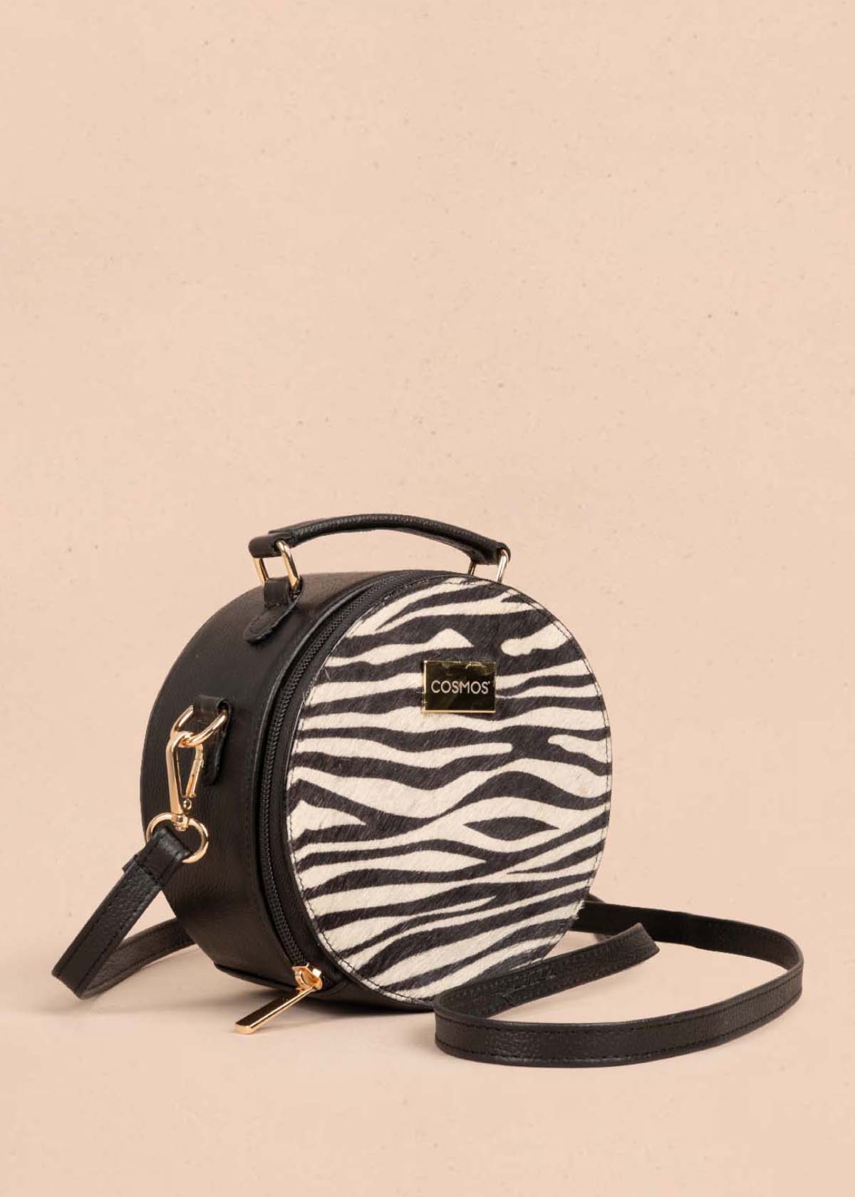 Bolso tipo bandolera en cuero color negro y cuero con pelo animal print 105312