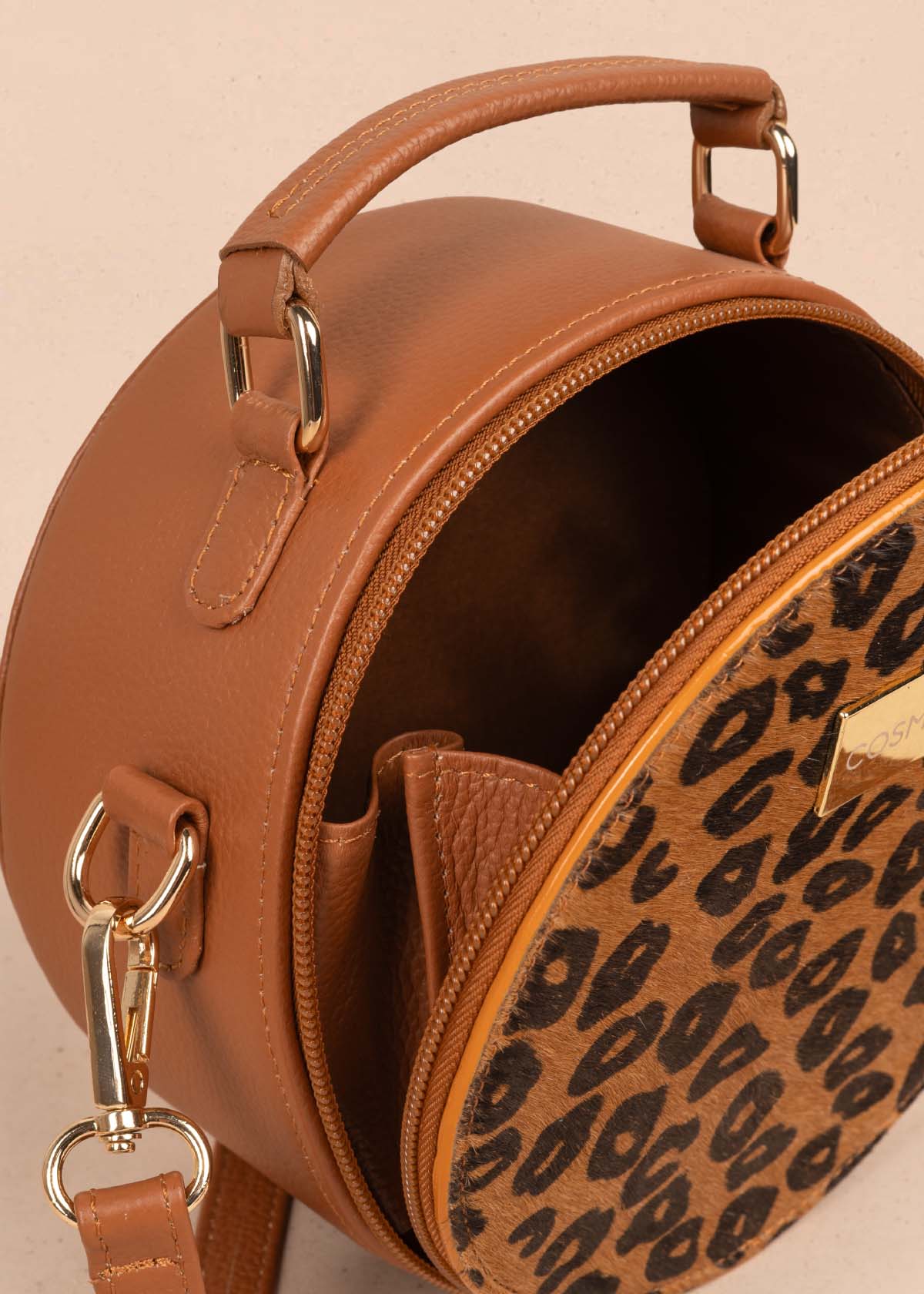 Bolso tipo bandolera en cuero color tabaco y cuero con pelo animal print 105312