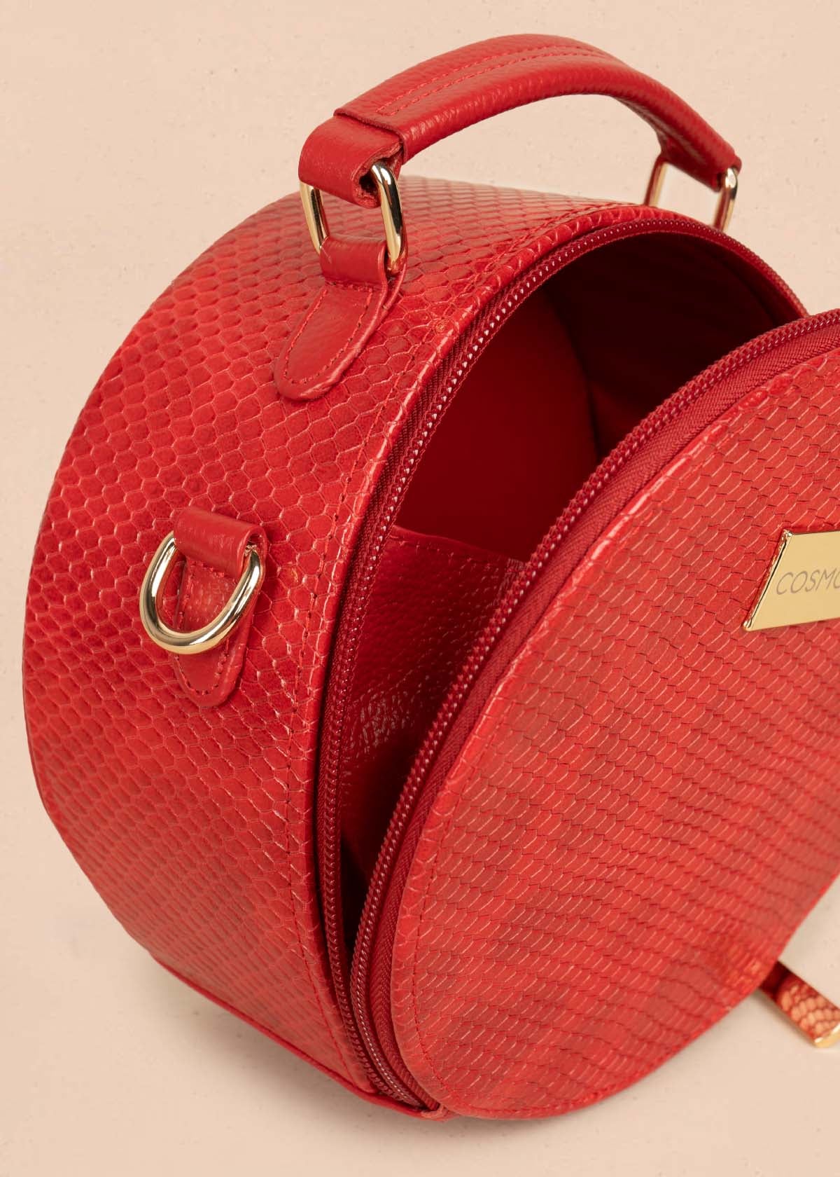 Bolso manos libres en cuero color rojo 105313