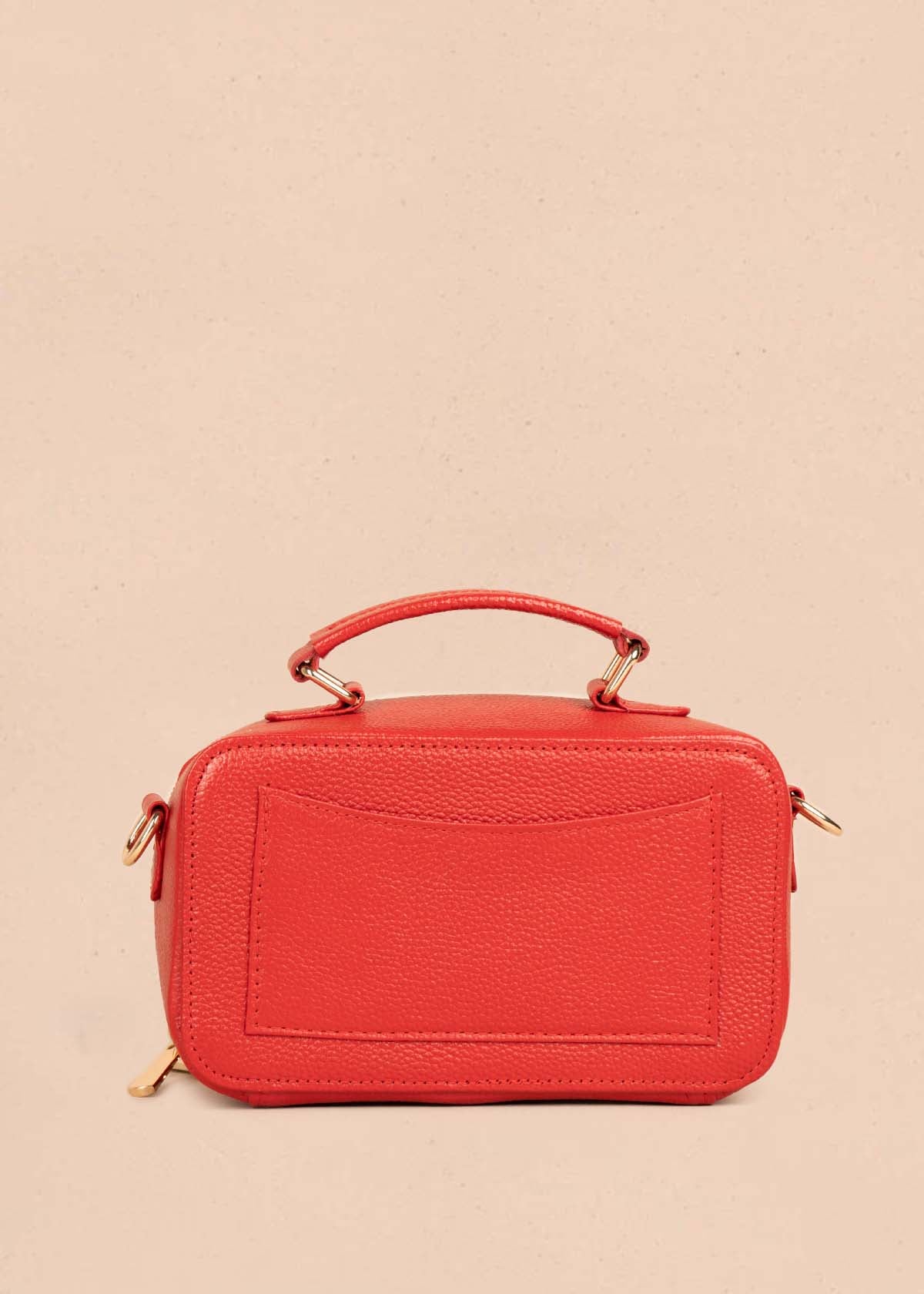 Bolso manos libres en cuero color rojo y cuero con pelo animal print 105315