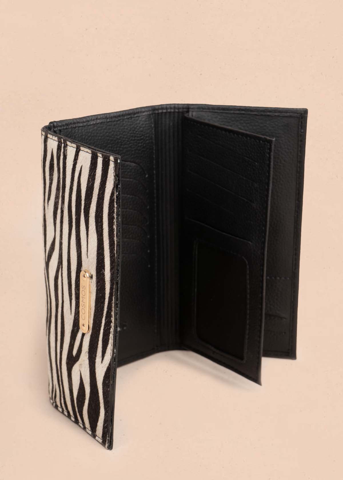 Billetera en cuero animal print color negro 105320