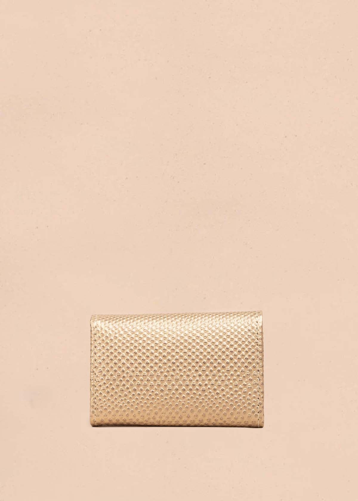 Porta llaves en cuero color dorado 105324