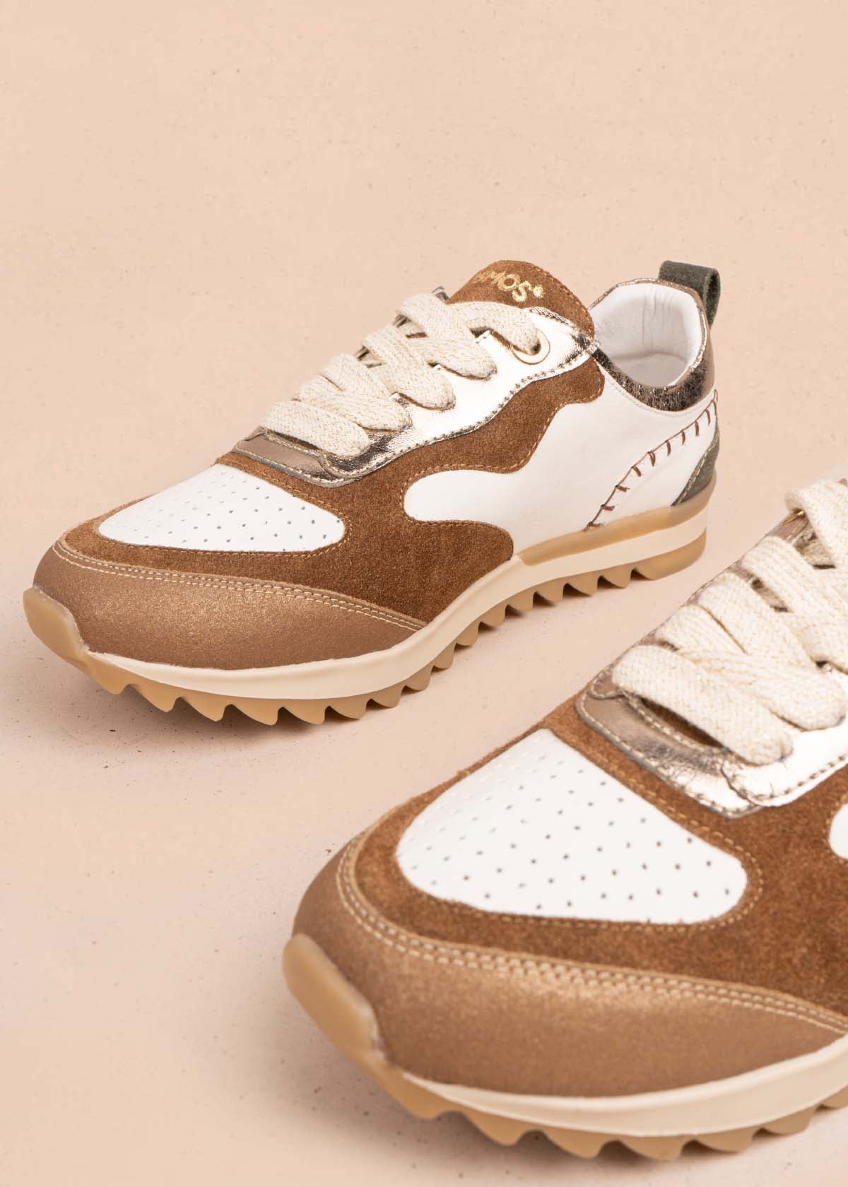 Tenis casuales en cuero color blanco con perforaciones 105477