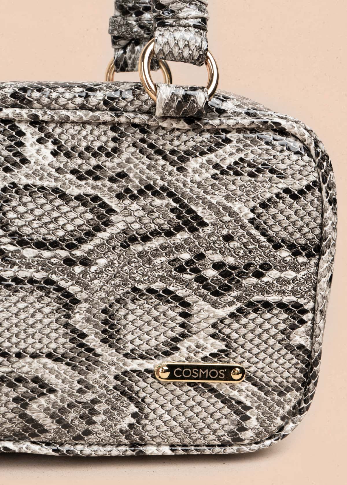 Bolso tipo cartera color blanco con estampado animal print 105564