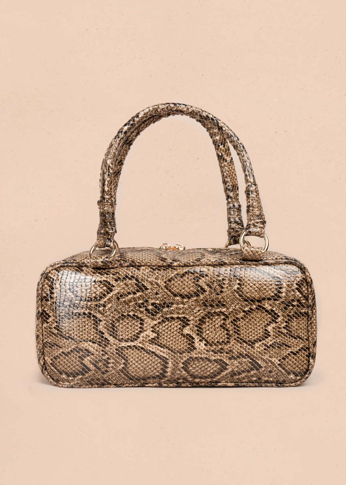 Bolso tipo cartera color camel con estampado animal print 105564