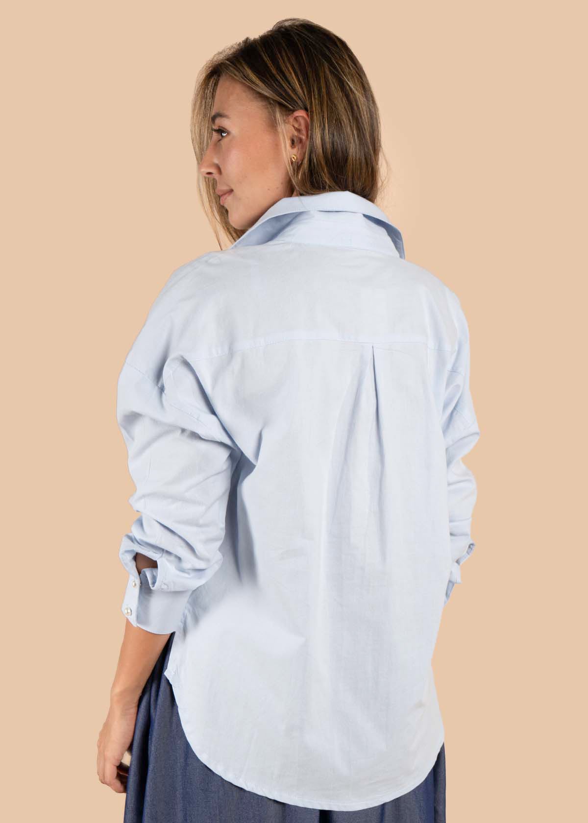 Blusa color azul claro con corazón en bolsillo 105612