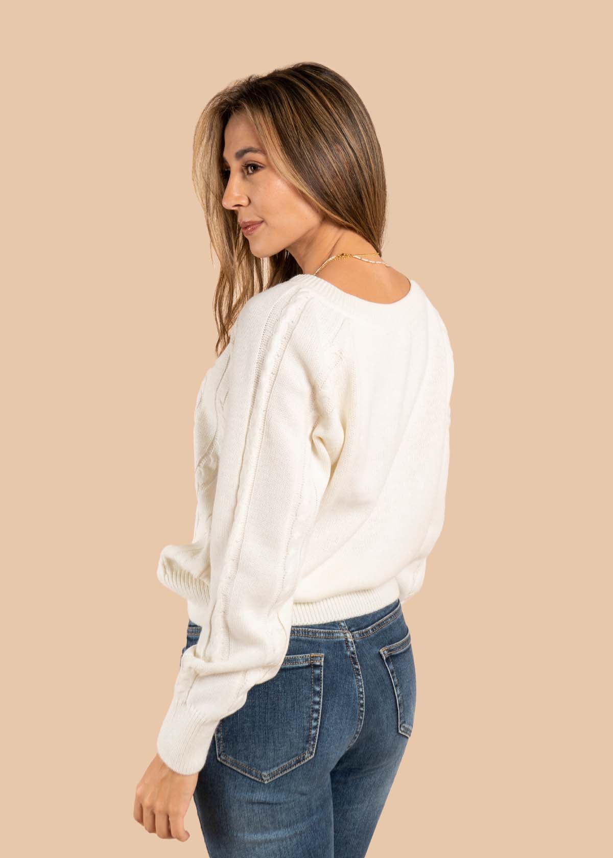 Sweater color crema con botones 105647