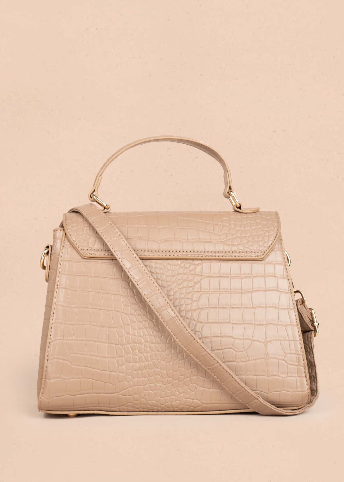 Bolso manos libres color taupe con textura croco 105772