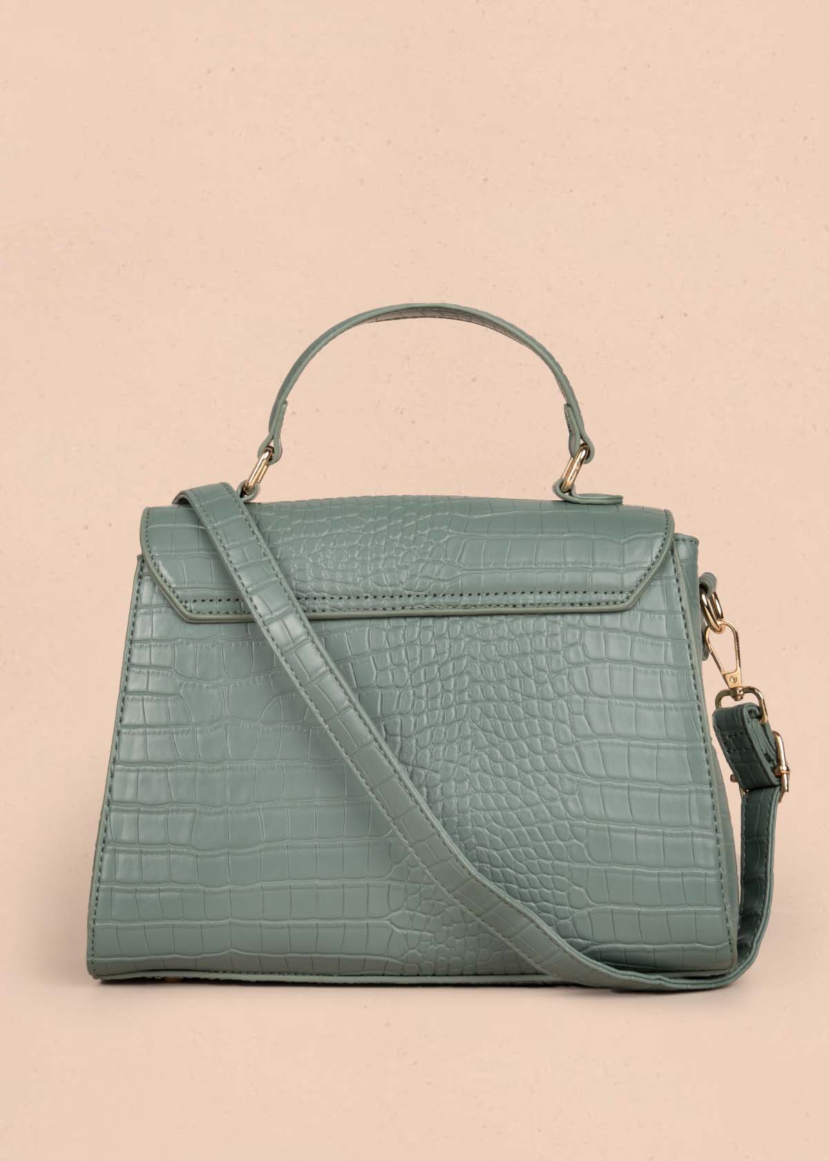 Bolso manos libres color verde con textura croco 105772