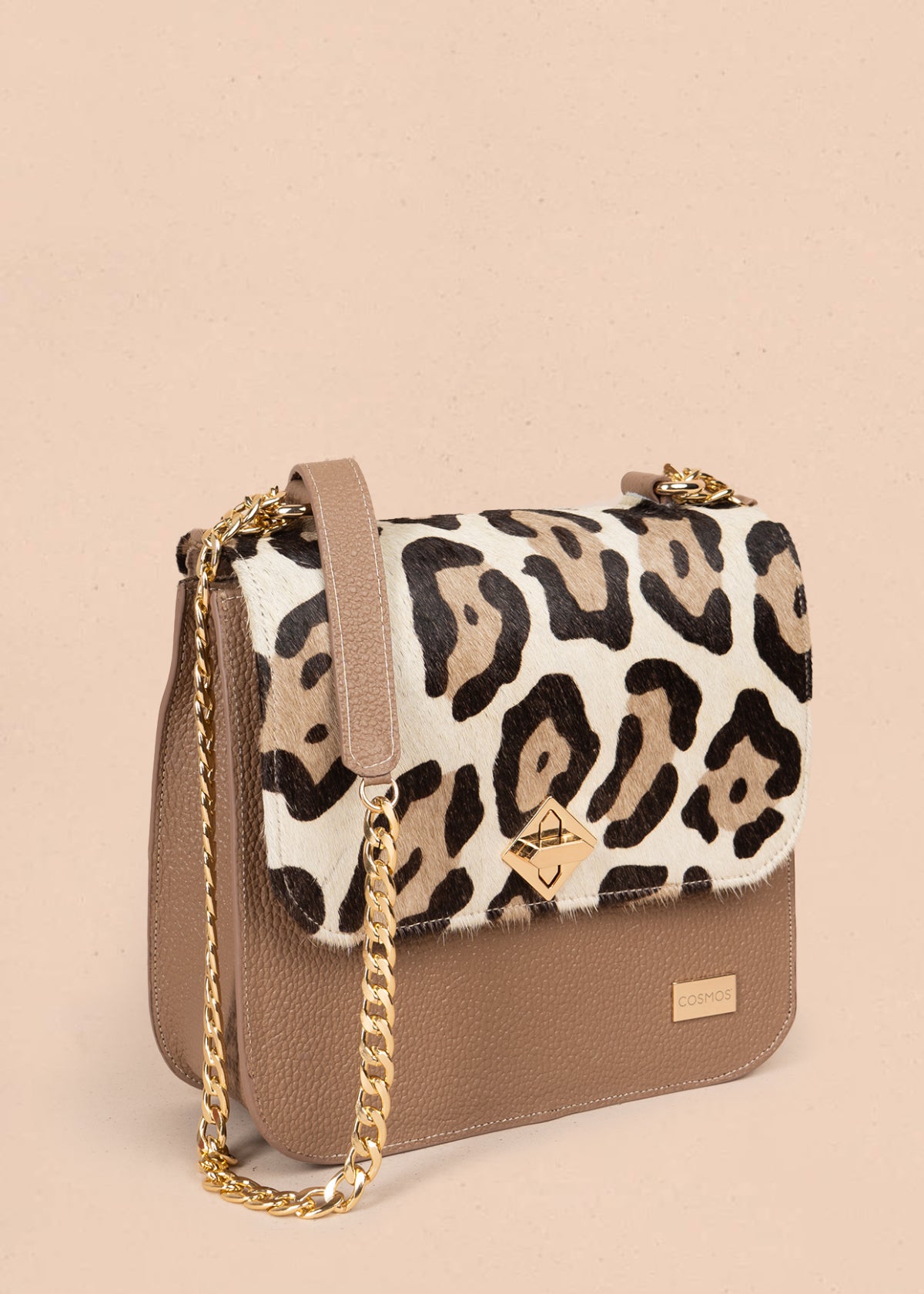 Bolso manos libres en cuero color café con estampado animal print y cadena dorada 105934