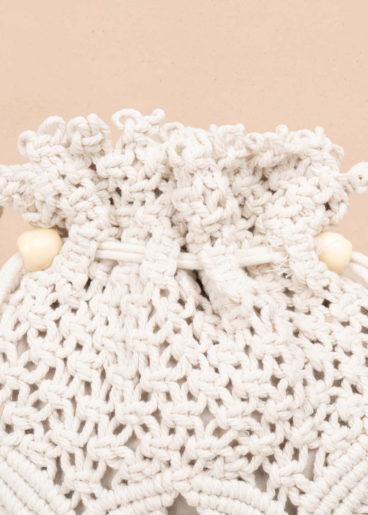 Bolso en tejido color beige tipo saco 105939