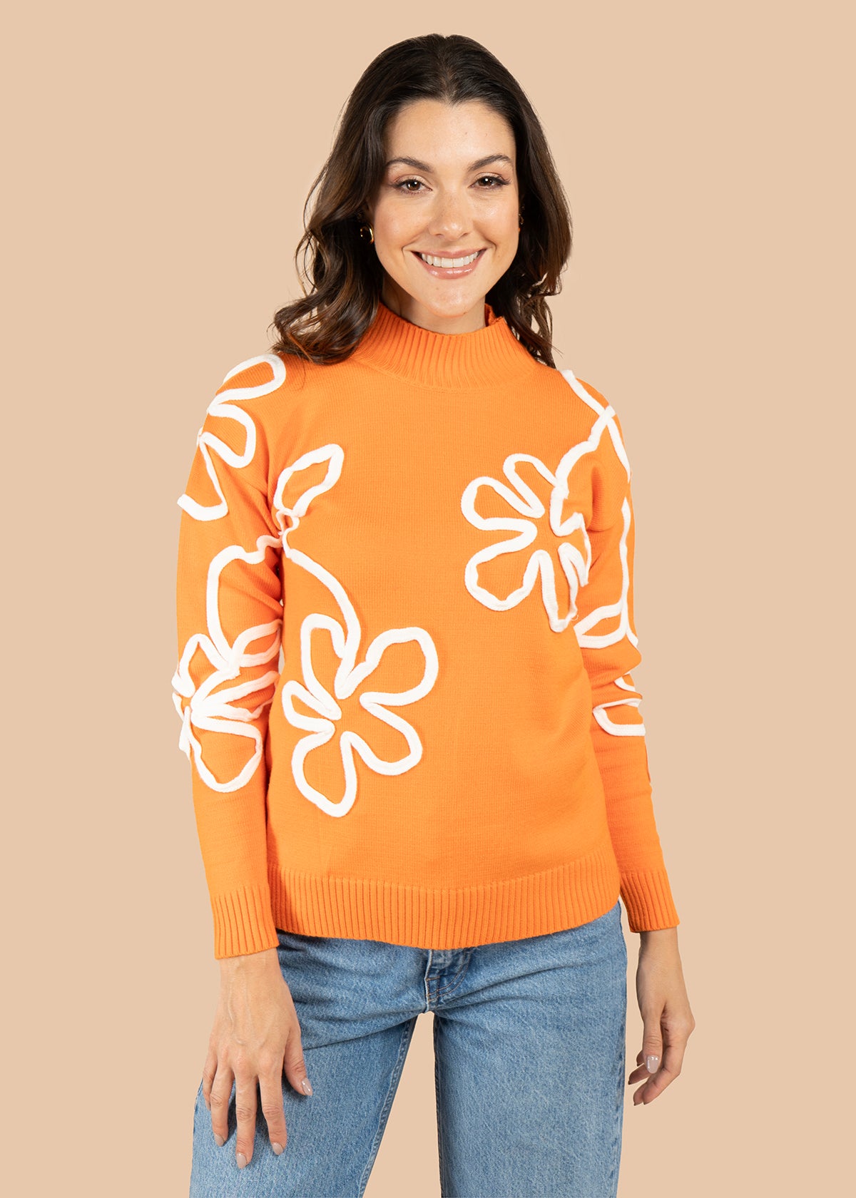Buzo color naranja con flores bordadas 106060