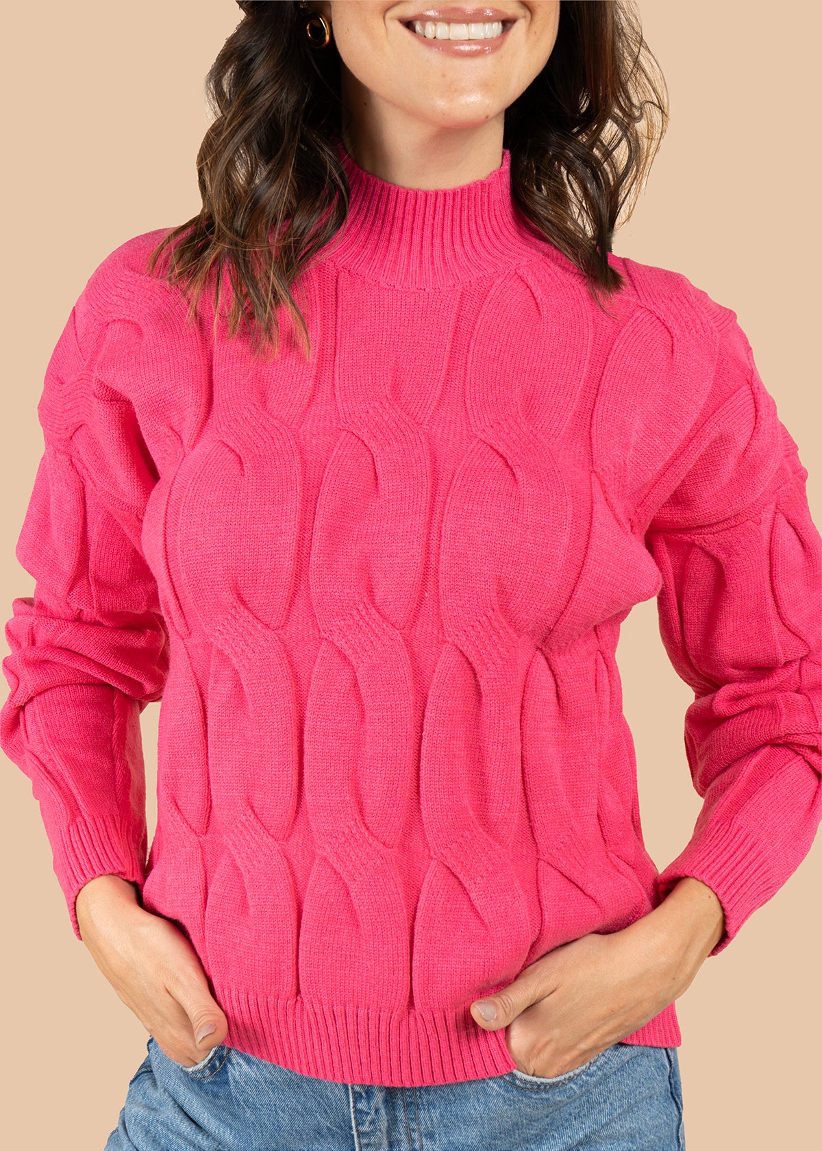 Buzo color fucsia con tejido trenzado 106068