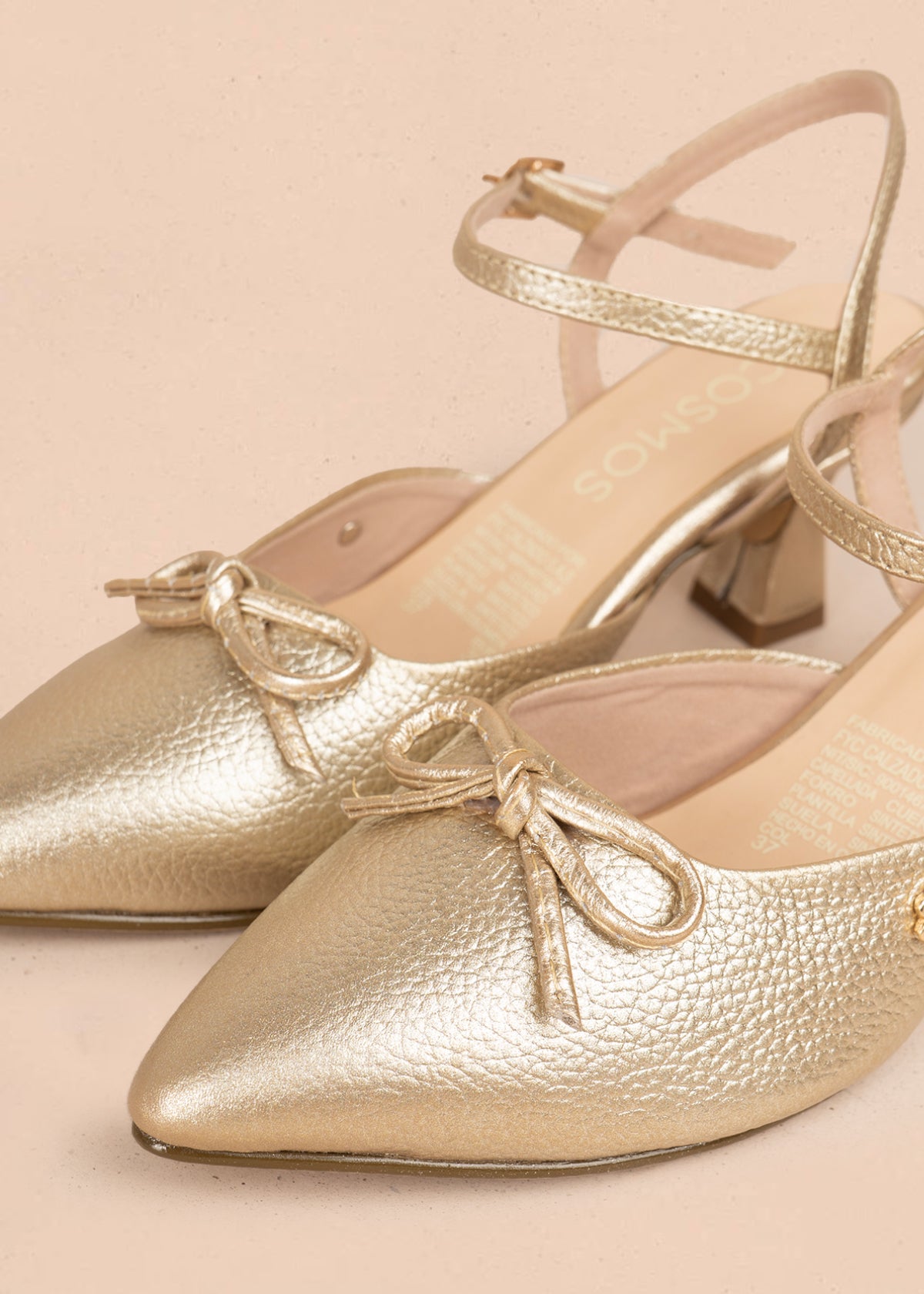 Tacones trabilla en cuero color champaña con moño 106087