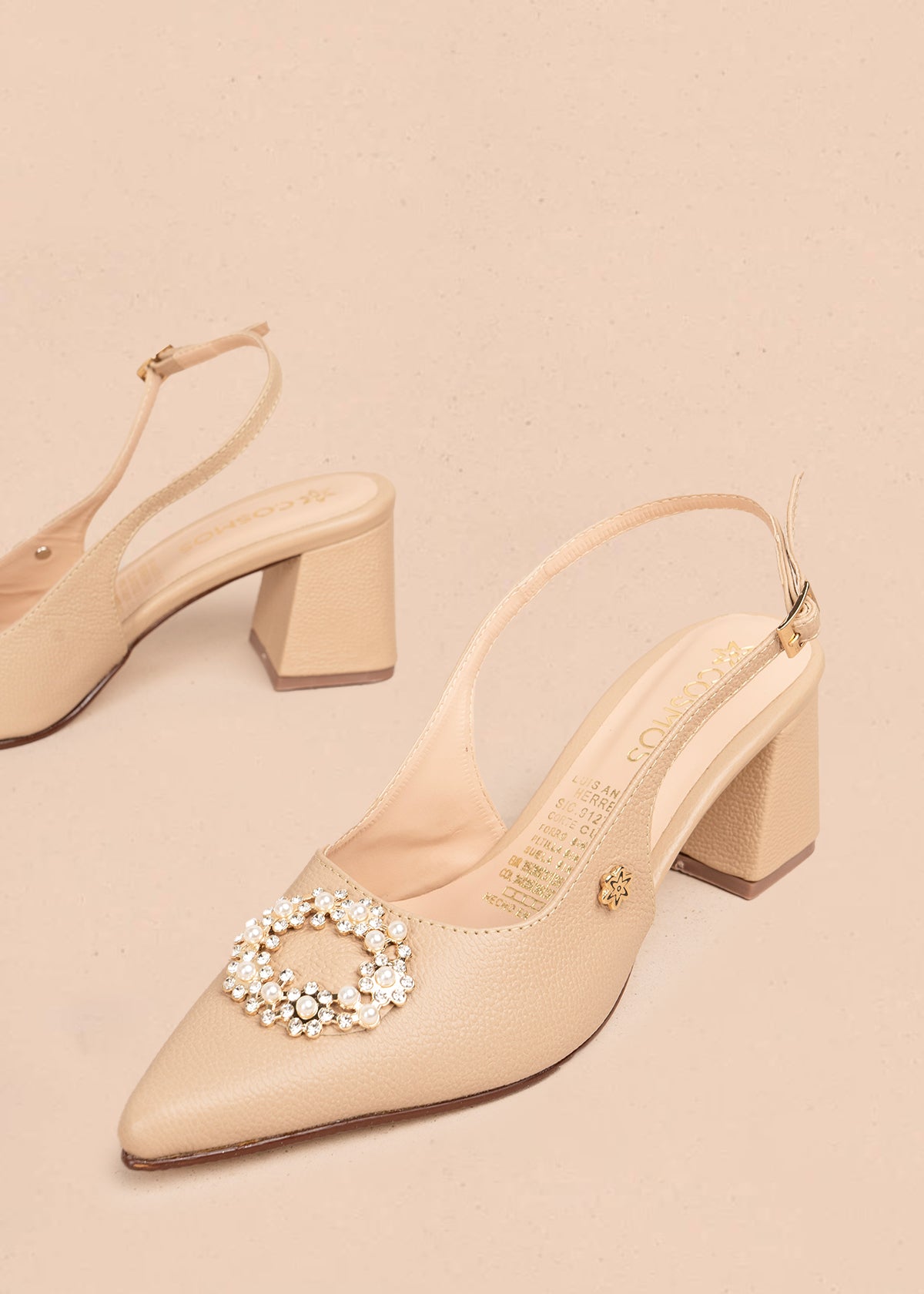 Trabilla en cuero color beige con aplique de perlas y cristales en punta 106148