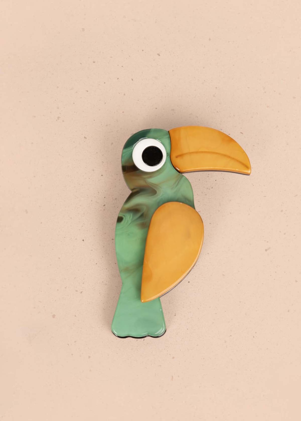 Prendedor de tucán color verde 106206