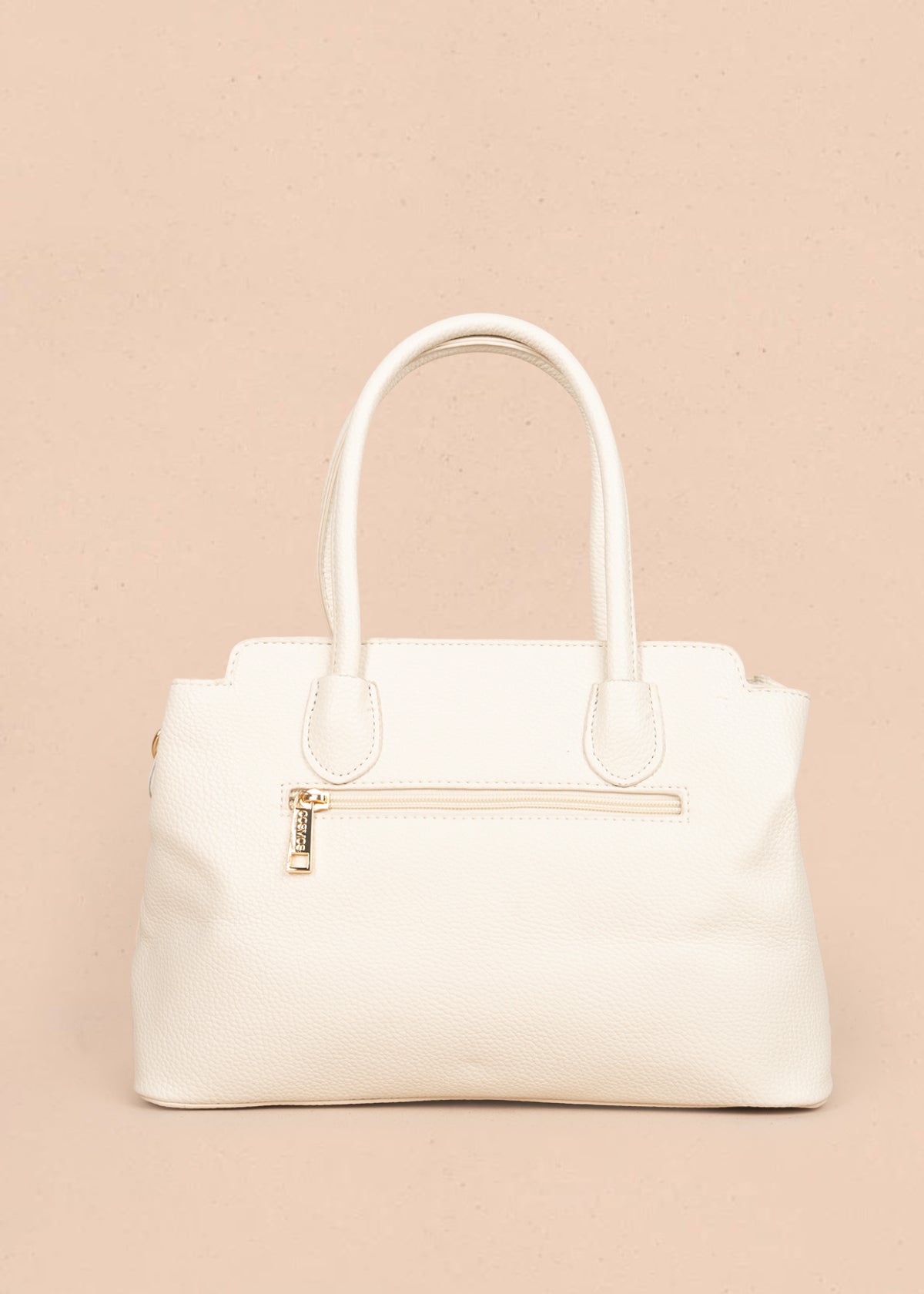 Bolso tipo cartera color crema con grabado de rombos 106300