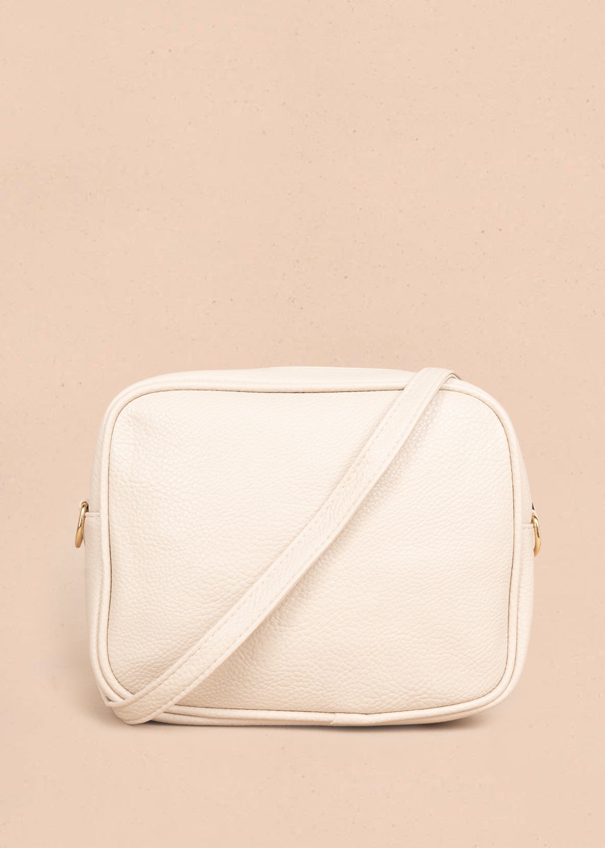 Bolso manos libres color beige con doble cremallera dorada 106336