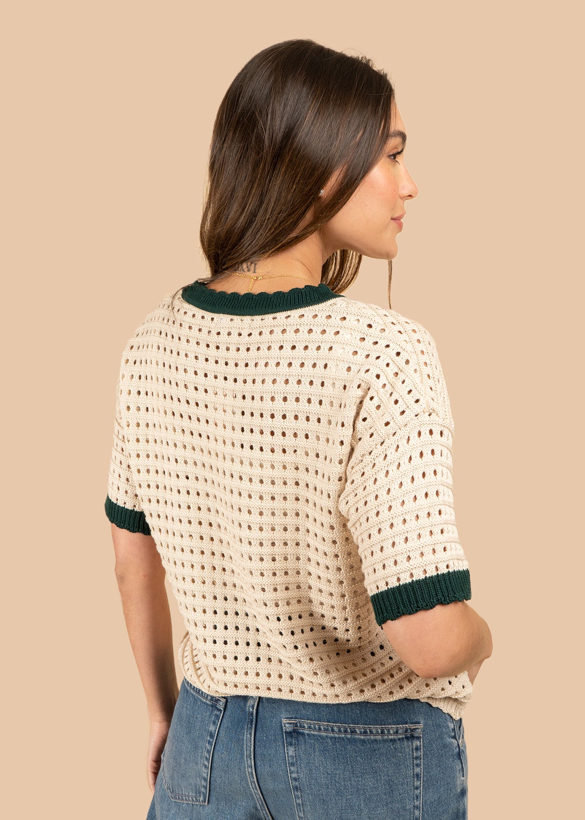 Blusa tejida color verde tipo perforado manga corta 106459
