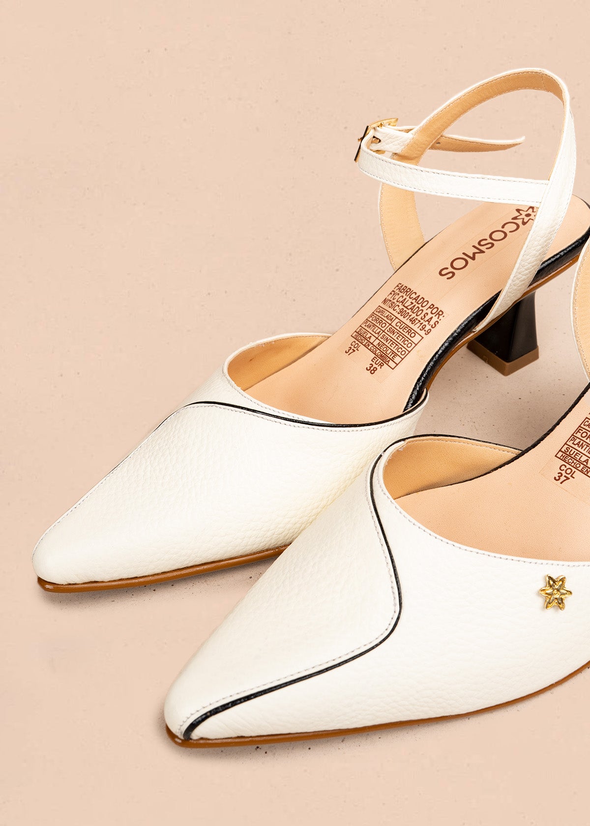 Tacones trabilla en cuero color blanco con detalle de ribete 106510