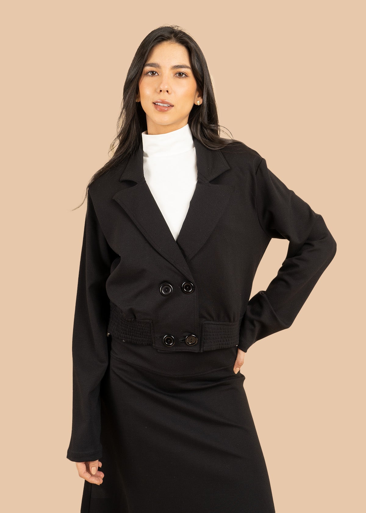 Chaqueta color negro con solapa y doble botonadura 106590
