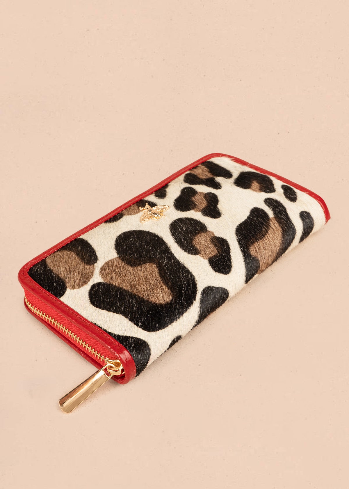 Billetera grande de cuero color rojo con animal print 106639