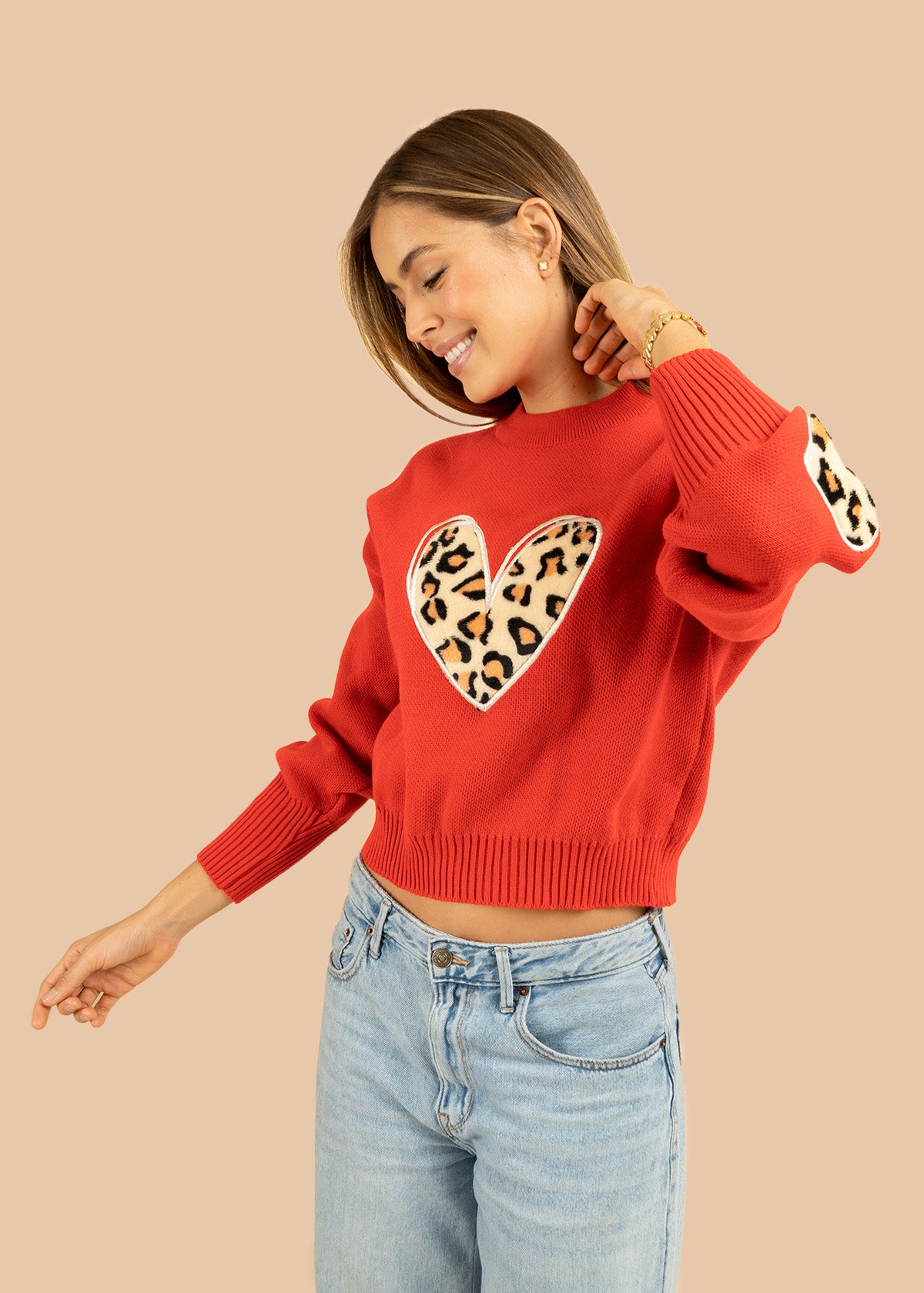 Buzo tejido color rojo con corazón en animal print 106683