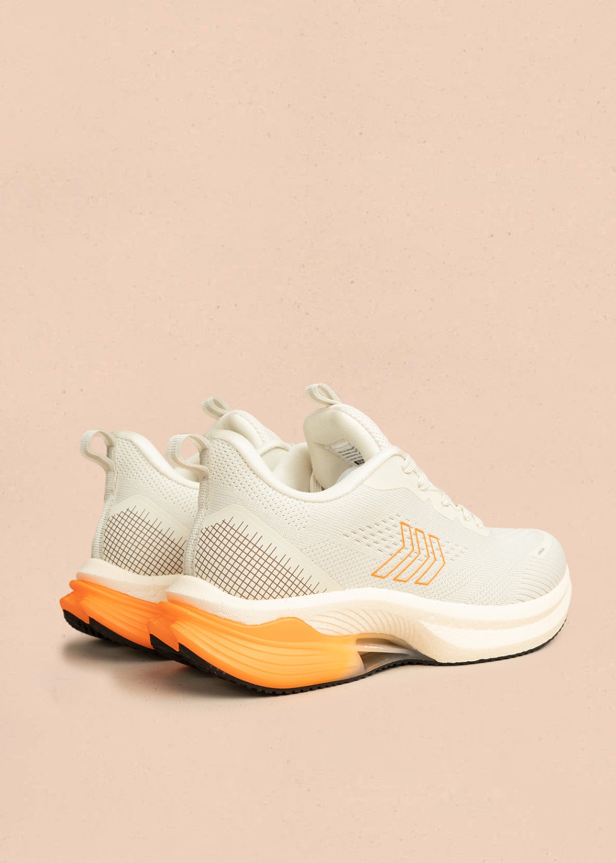 Tenis deportivos color beige con detalle naranja en suela 106690