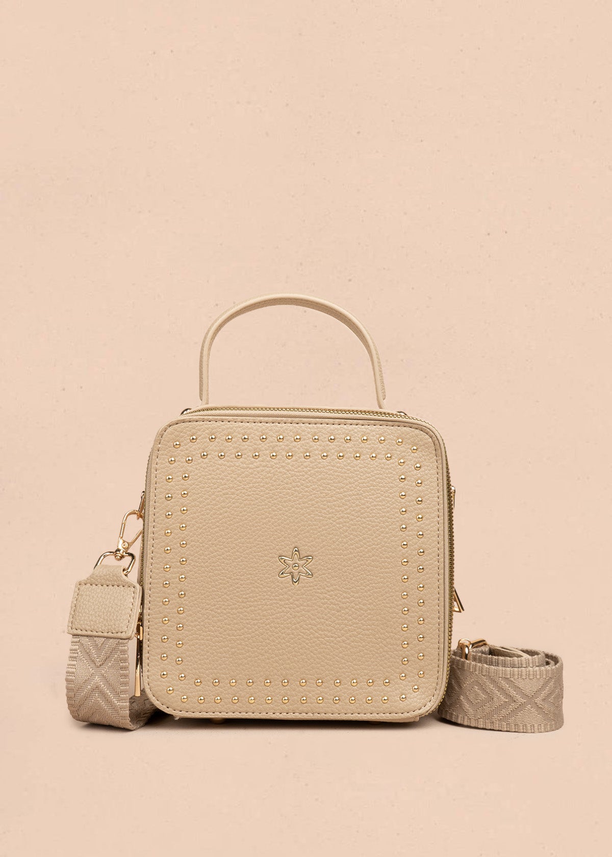 Bolso manos libres color beige con taches 106839