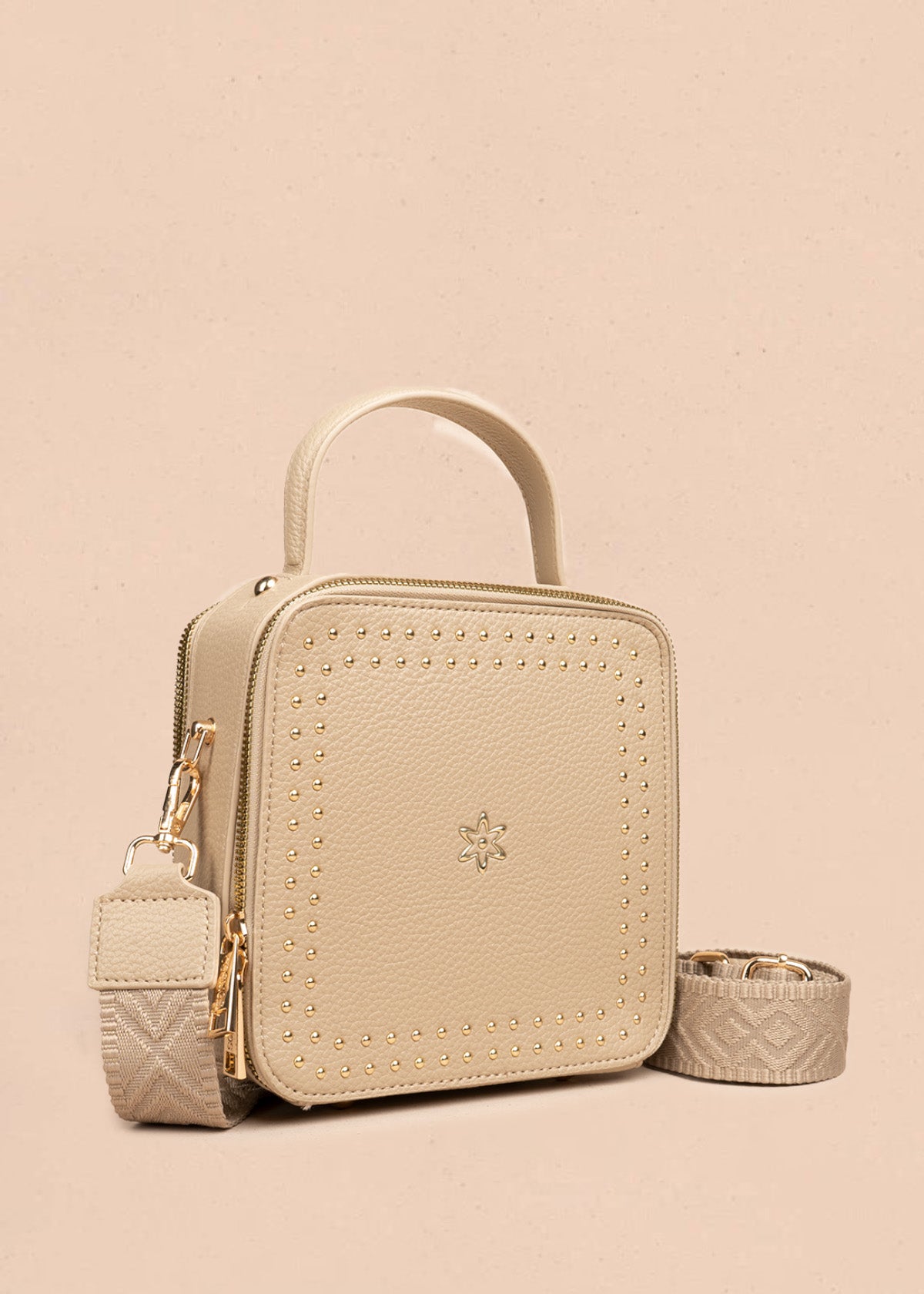 Bolso manos libres color beige con taches 106839