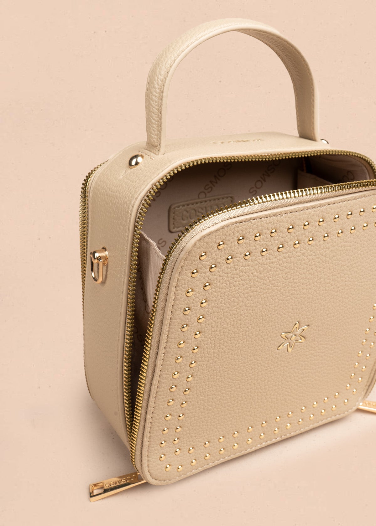 Bolso manos libres color beige con taches 106839