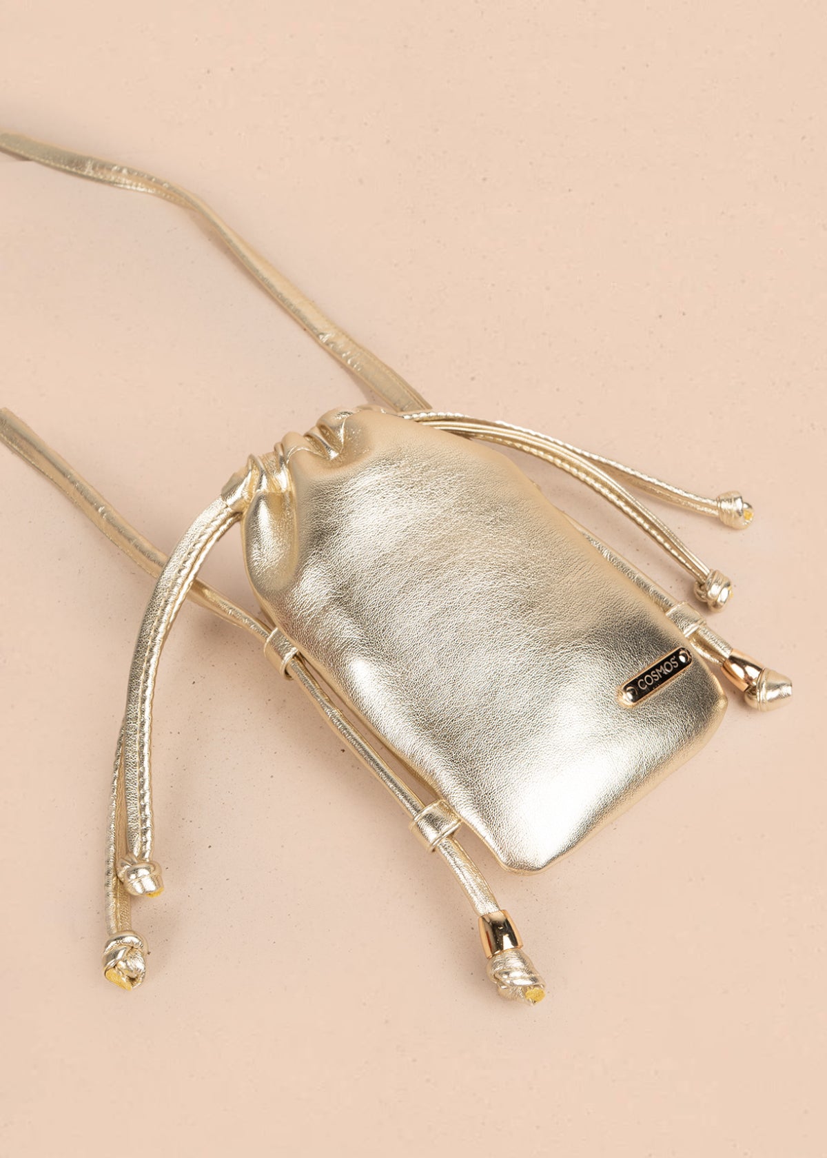 Bolso manos libres color champaña 106964