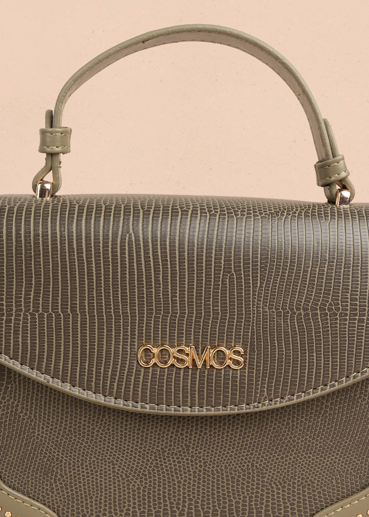 Bolso manos libres color verde con textura croco y detalles dorados 106983