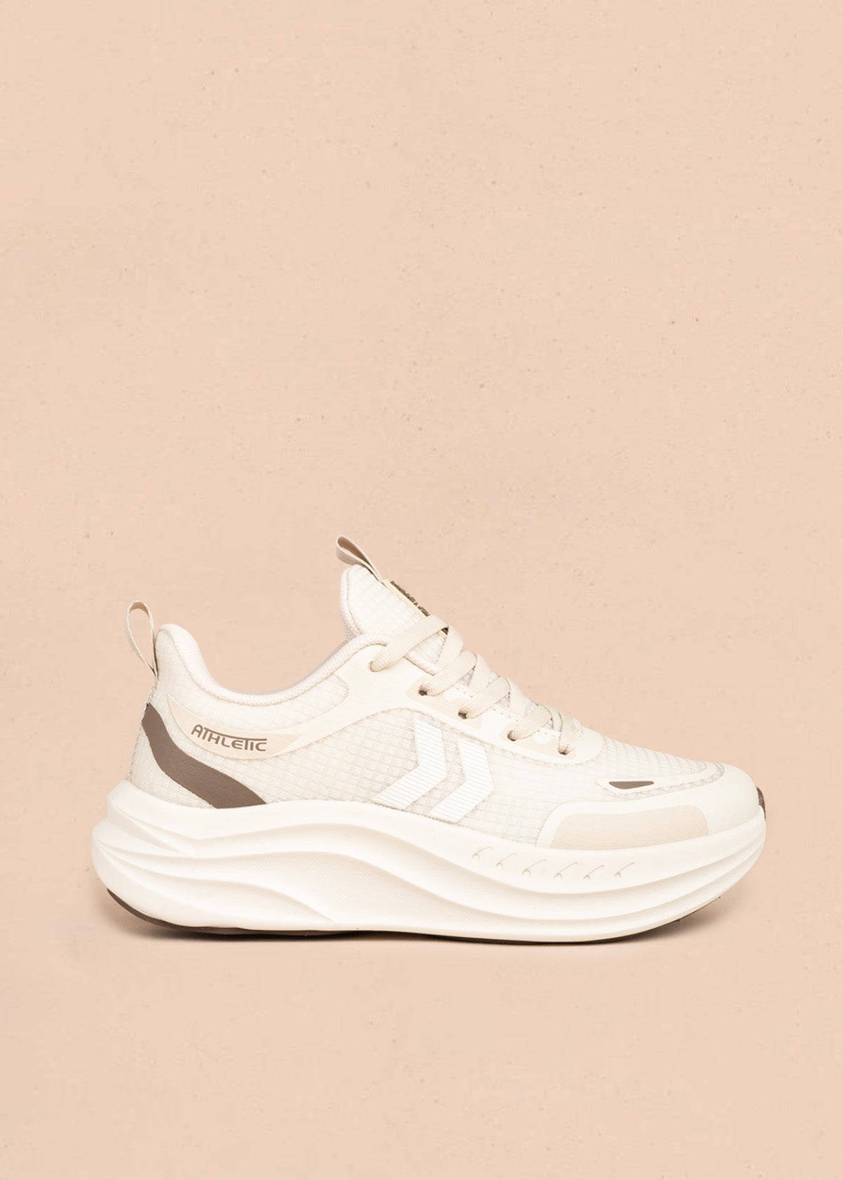 Tenis deportivos en textil color beige con flechas 107069