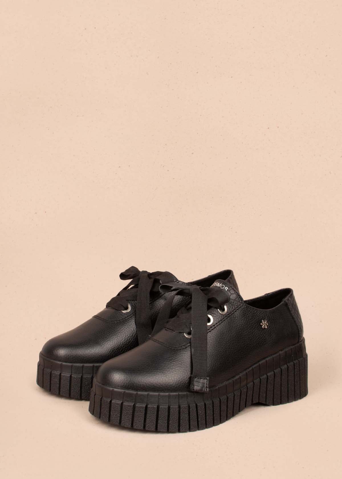 Ataduras en cuero color negro con textura tipo croco 104476