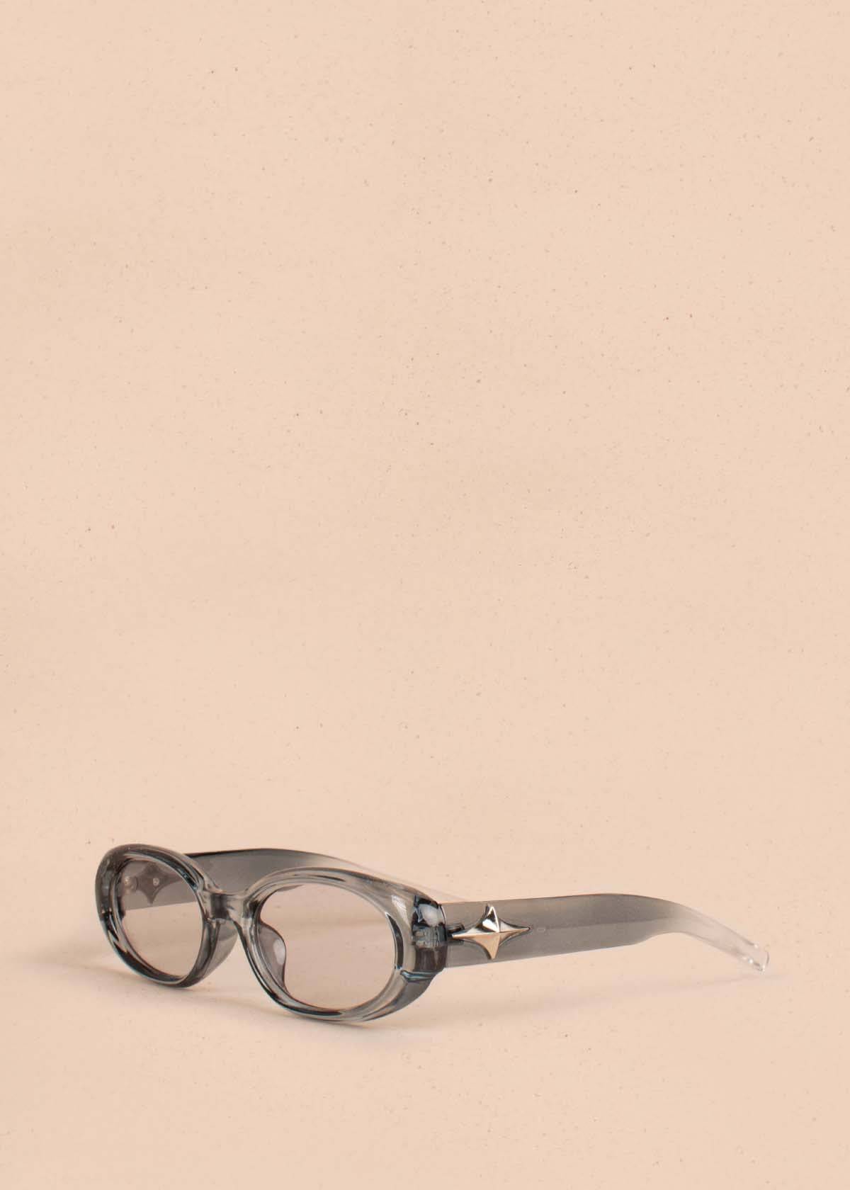 Gafas de sol color azul con marco ovalado 104527