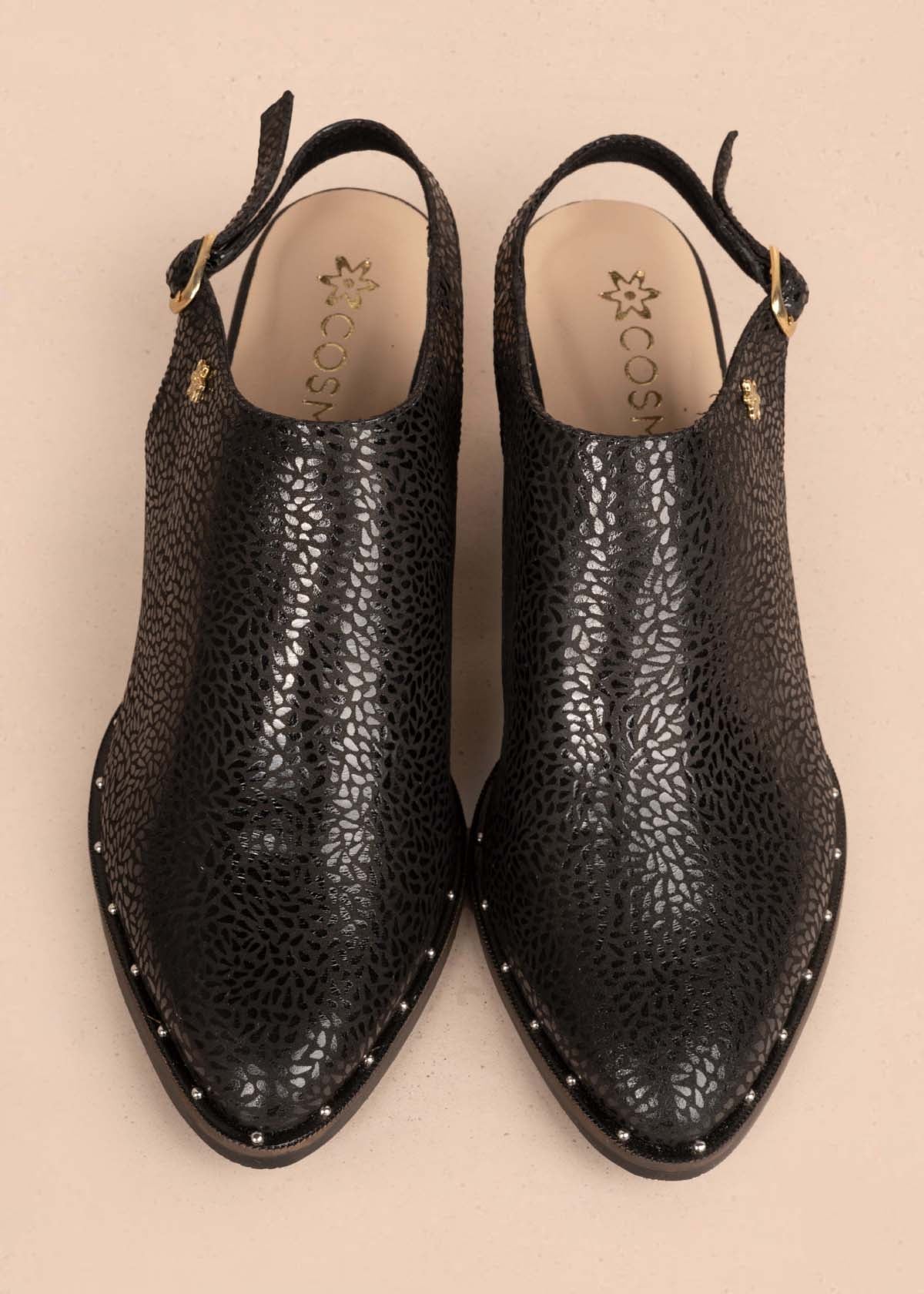 Botines en cuero color negro con correa 105093