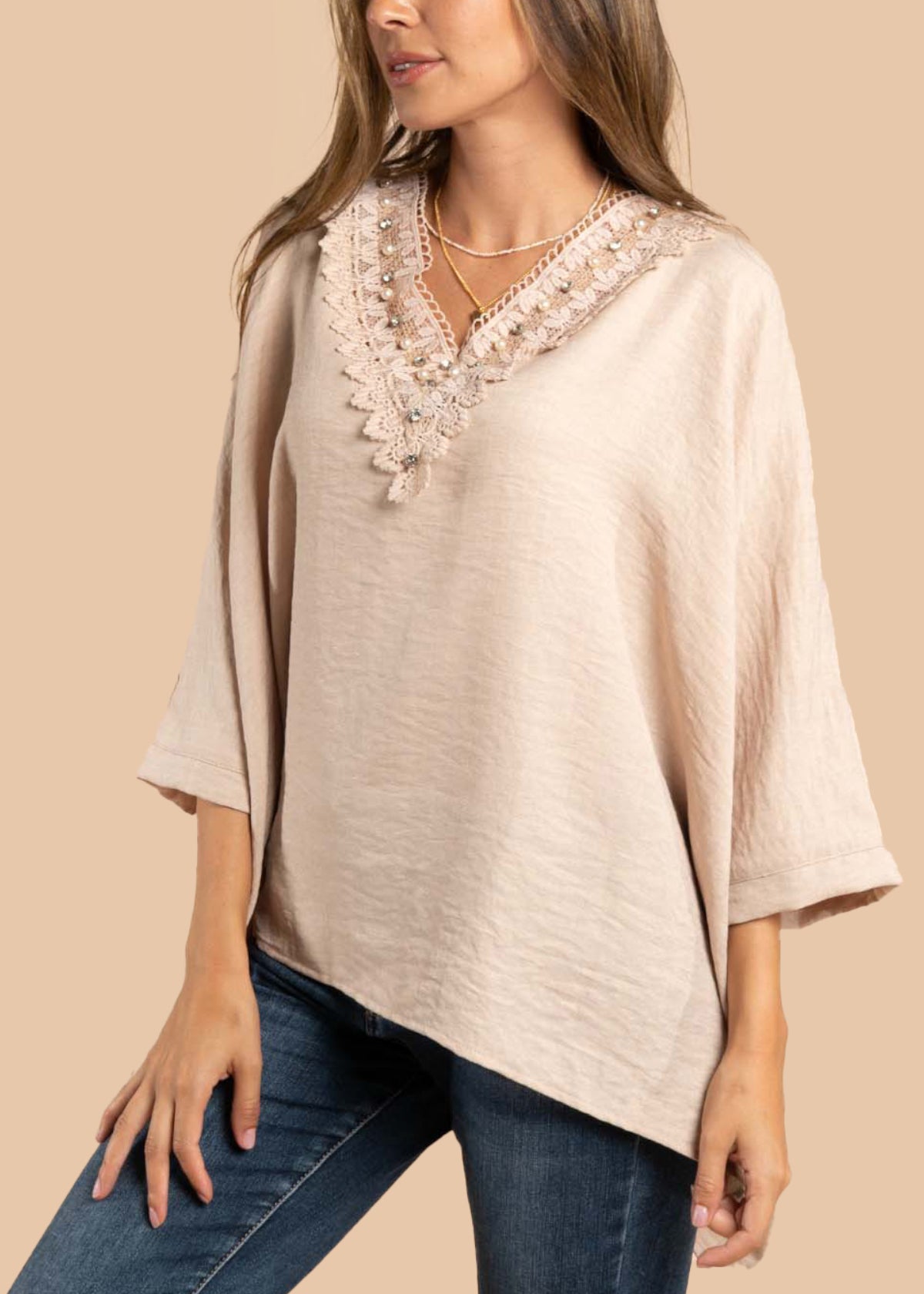 Blusa color beige con perlas 105198