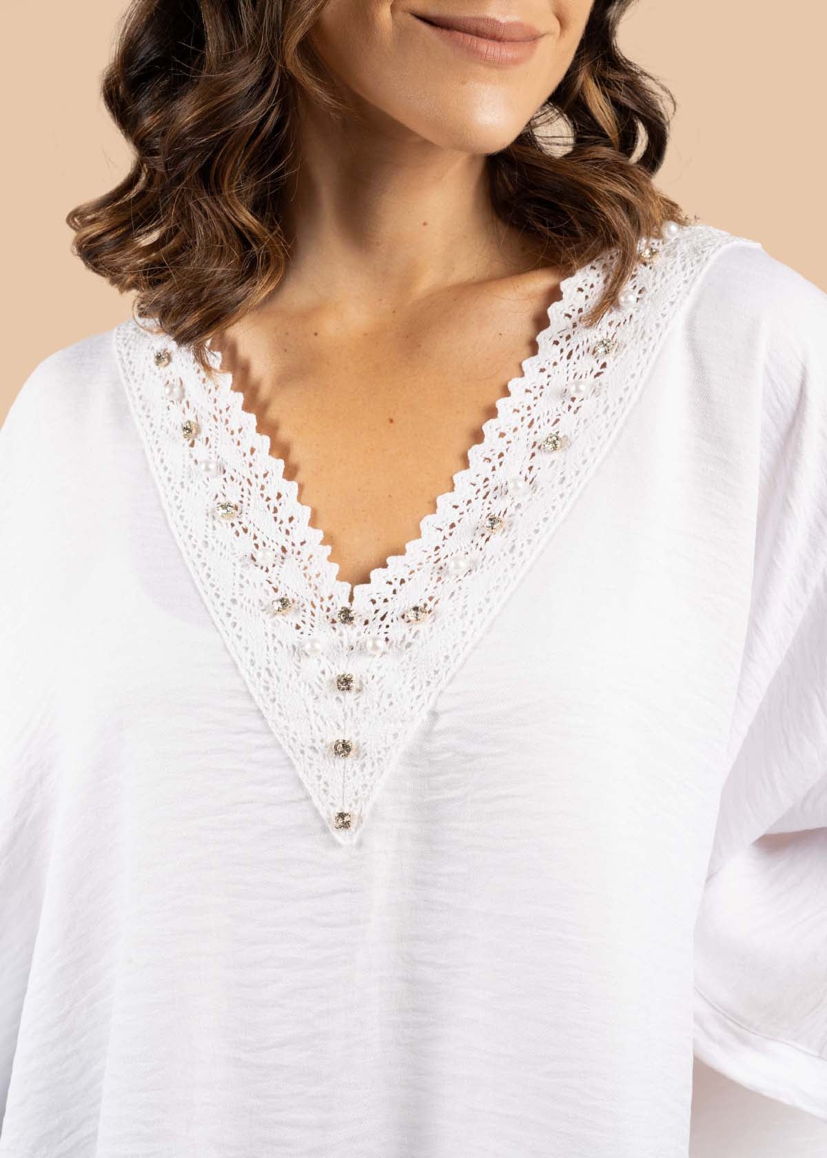 Blusa color blanco con perlas 105198