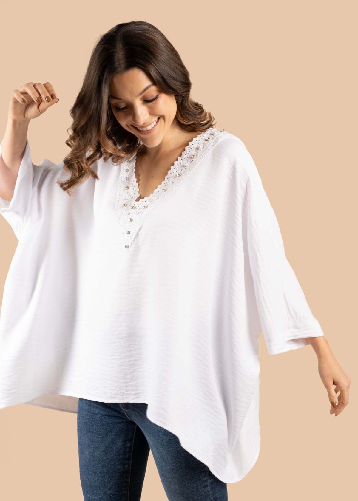 Blusa color blanco con perlas 105198
