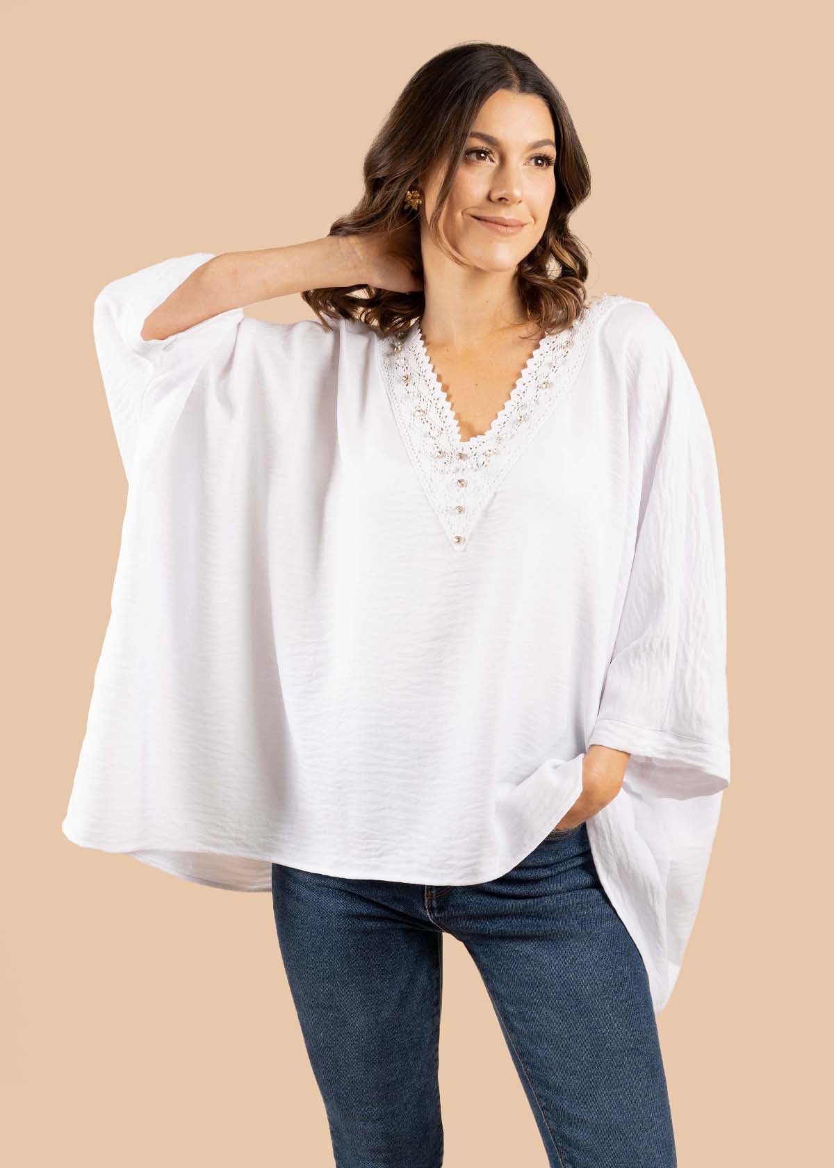 Blusa color blanco con perlas 105198