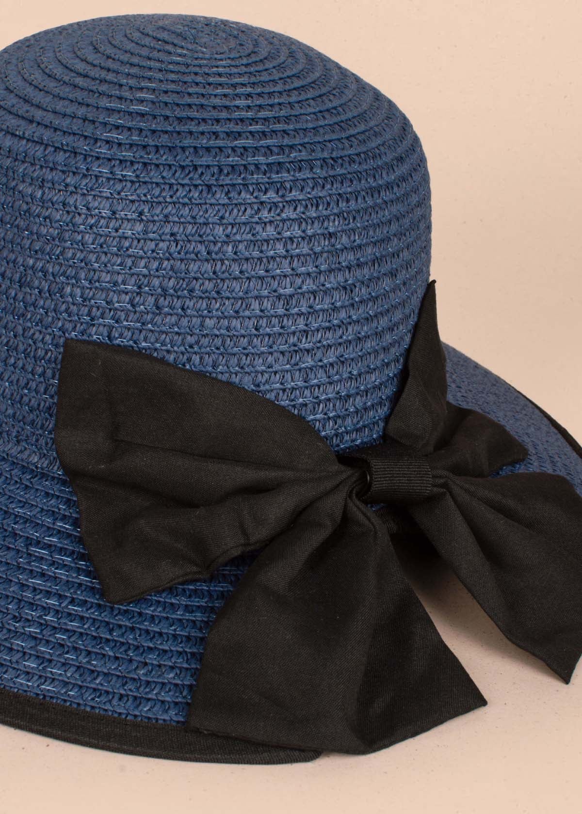 Pava en yute color azul con moño 105234