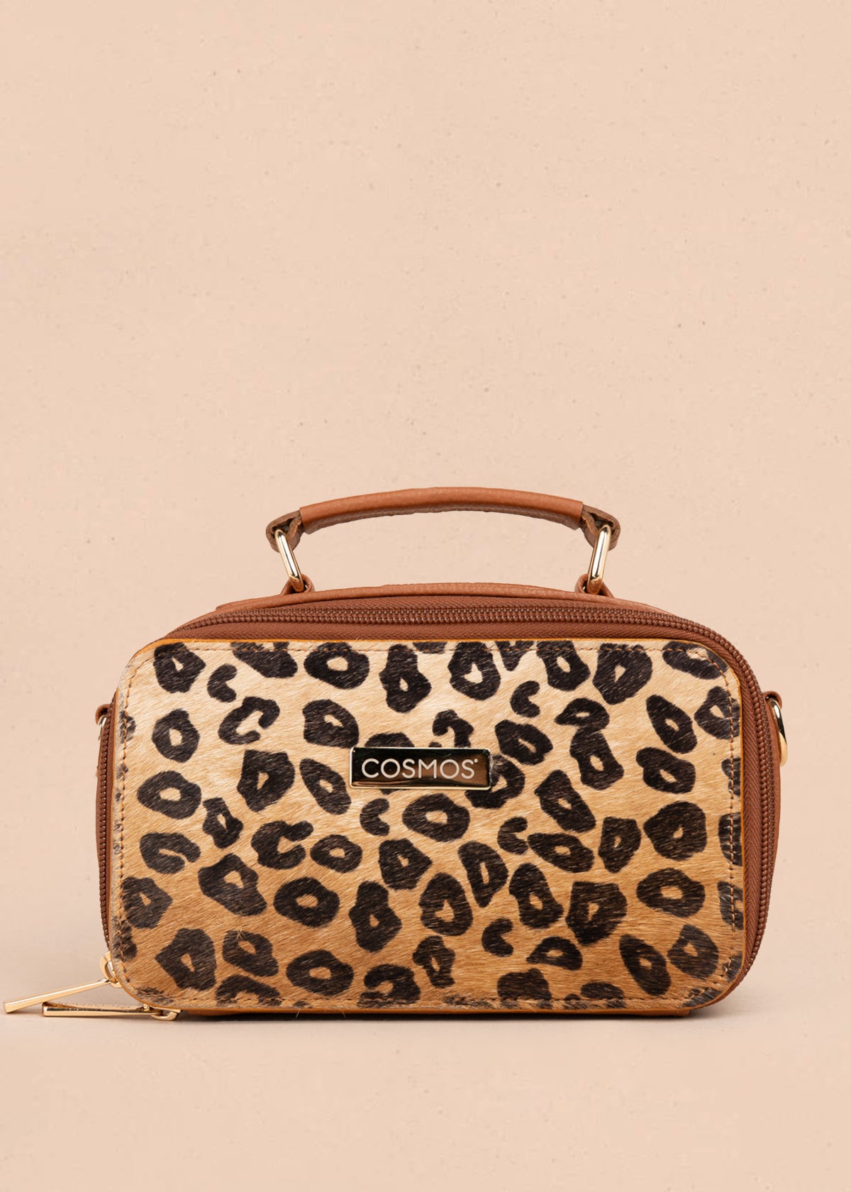 Bolso manos libres en cuero color tabaco y cuero con pelo animal print 105315