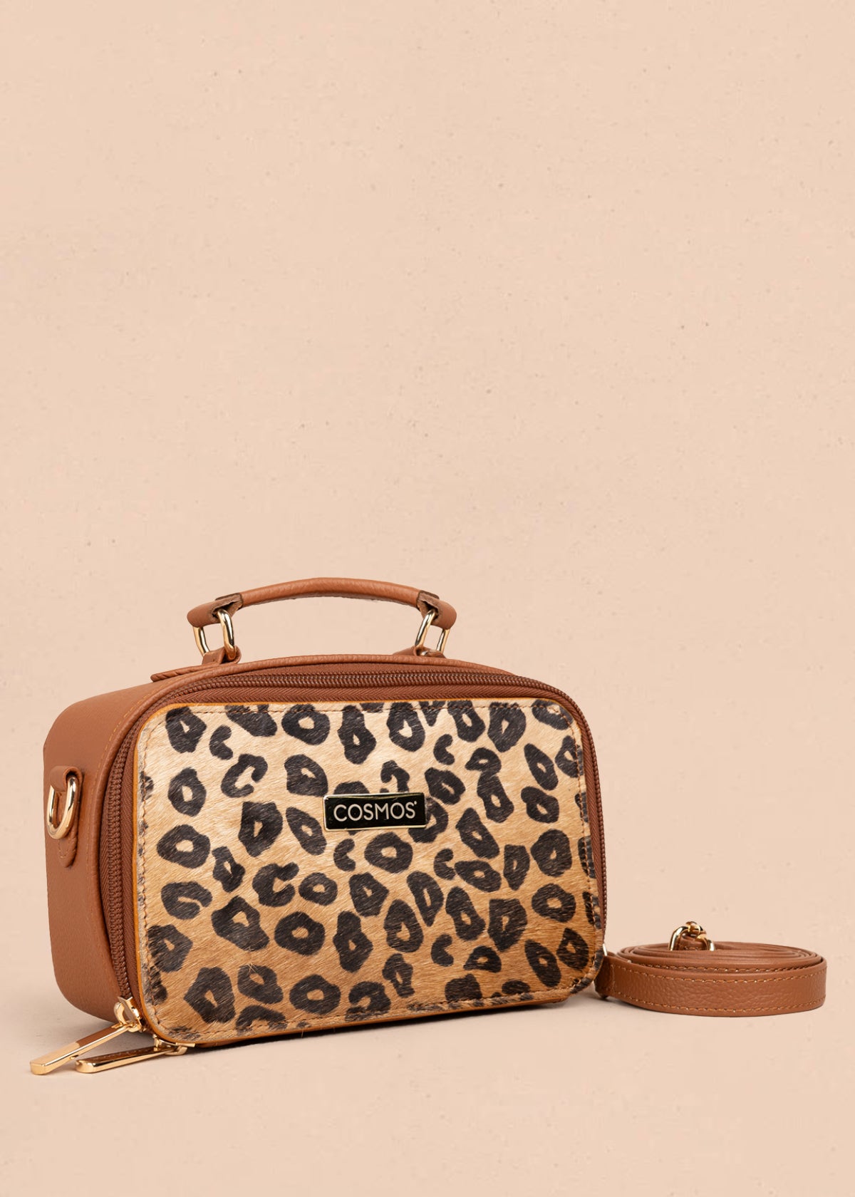 Bolso manos libres en cuero color tabaco y cuero con pelo animal print 105315