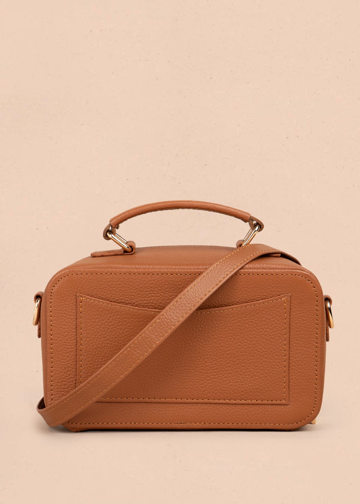 Bolso manos libres en cuero color tabaco y cuero con pelo animal print 105315