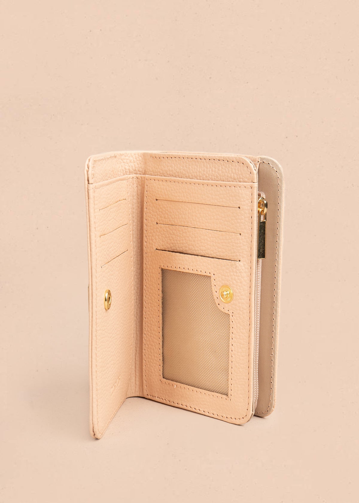 Billetera en cuero color nude con detalle hexagonal 105323