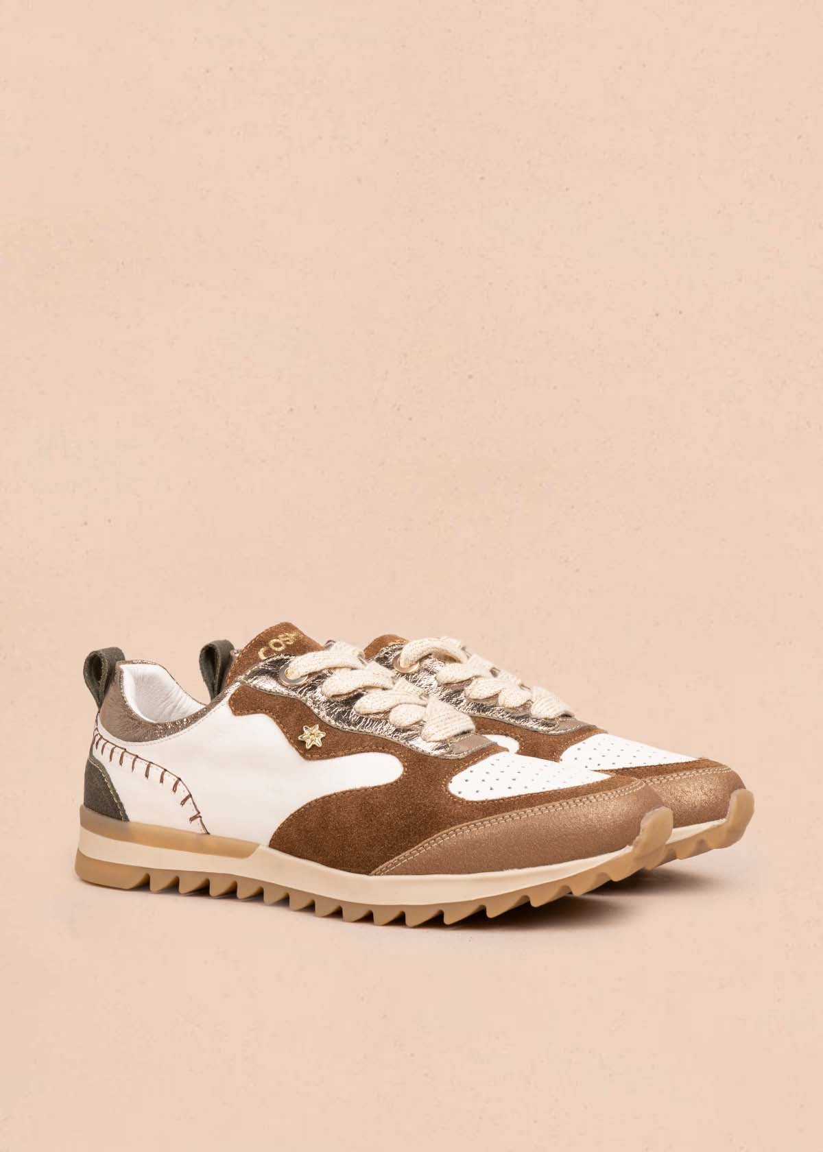 Tenis casuales en cuero color blanco con perforaciones 105477