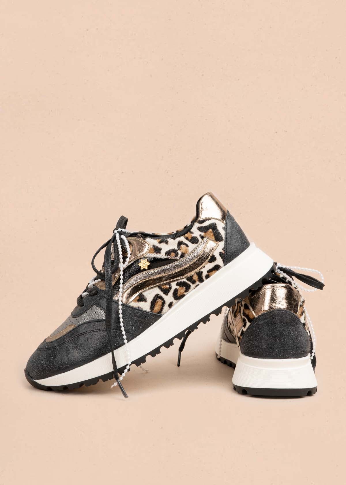 Tenis casuales en cuero color negro 105481